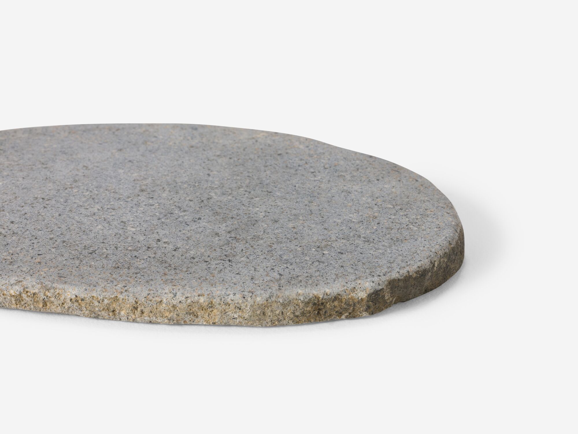 Right detail view of small natural stone platter